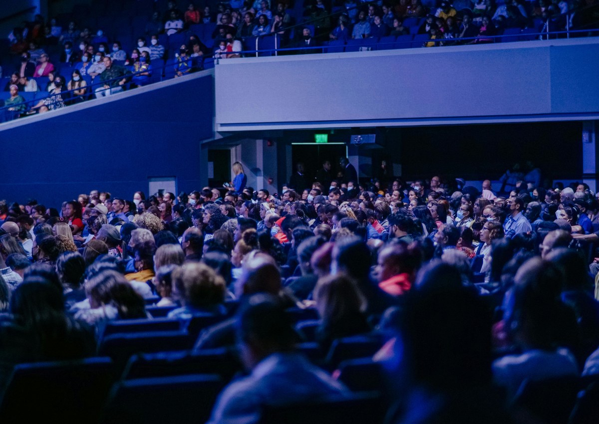 Audience seated in a conference venue